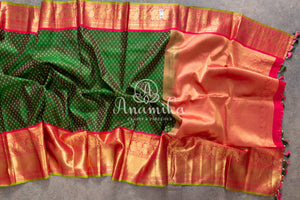 Green Kanchipattu saree with intricately designed work blouse