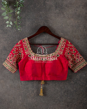 Green Kanchipattu saree with intricately designed work blouse