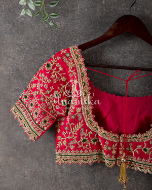 Green Kanchipattu saree with intricately designed work blouse