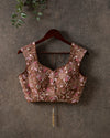 Pastel Pink Floral Georgette saree with contemporary sleeveless blouse