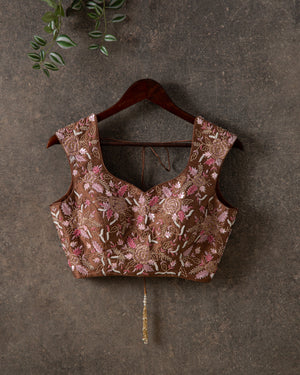 Pastel Pink Floral Georgette saree with contemporary sleeveless blouse