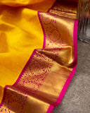 Yellow Kanchipattu saree with wine color border and blouse