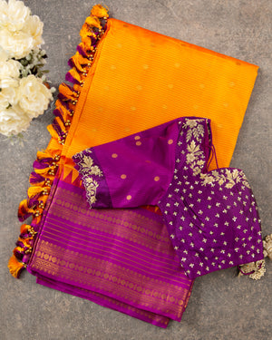 Tangerine Orange Gadwal Silk saree with a Purple Border