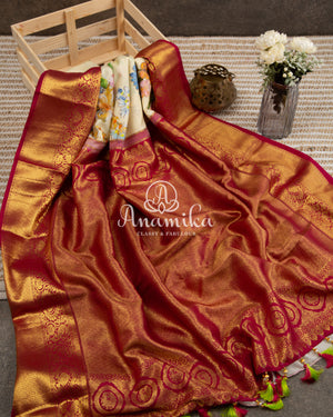 Off white Floral Kanchipattu saree with contrast wine border