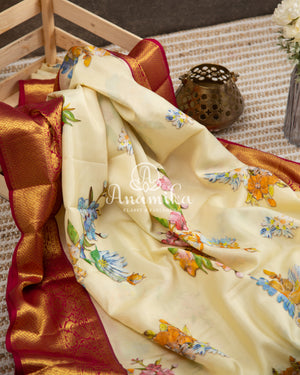 Off white Floral Kanchipattu saree with contrast wine border