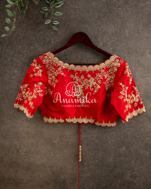 Pink Floral Kanchipattu saree with contrast red zardosi work blouse