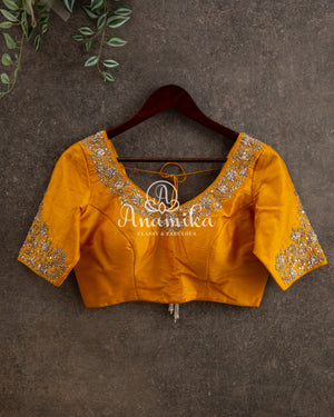 Pastel Pink Kanchipattu saree with yellow maggam work border