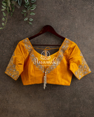 Pastel Pink Kanchipattu saree with yellow maggam work border