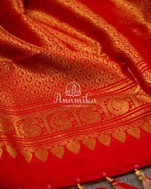 Pink Floral Kanchipattu saree with contrast red zardosi work blouse