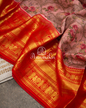Pink Floral Kanchipattu saree with contrast red zardosi work blouse