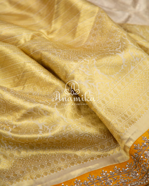 Pastel Pink Kanchipattu saree with yellow maggam work border