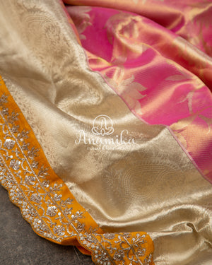 Pastel Pink Kanchipattu saree with yellow maggam work border