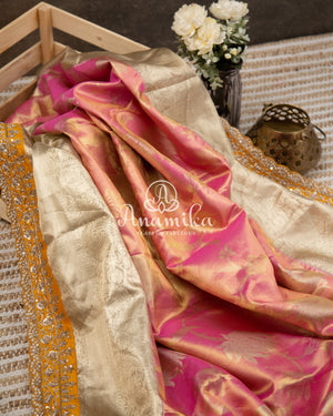 Pastel Pink Kanchipattu saree with yellow maggam work border