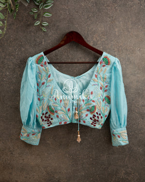 Green Floral Georgette saree with Blue heavywork blouse