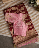 Beautiful Maroon Banarasi saree with contrast pink peach maggam work border