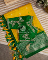 Lovely Yellow Gadwal pattu saree with contrast dark green border