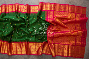 Dark Green Gadwal Silk saree with pink contrast border