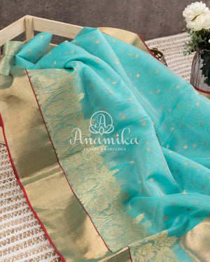 Blue Chanderi Silk Saree with a contrast red blouse