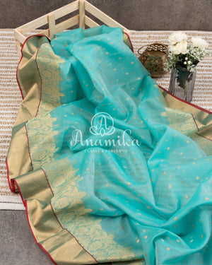 Blue Chanderi Silk Saree with a contrast red blouse