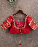 Blue Kalamkari Digital Print on crepe silk with a beautifully designed red blouse