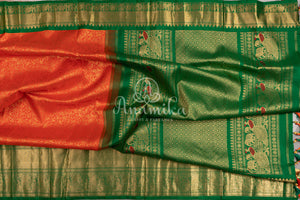 Gadwal Kanchi saree in Orange with beautiful green border and pallu