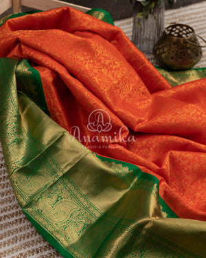 Gadwal Kanchi saree in Orange with beautiful green border and pallu