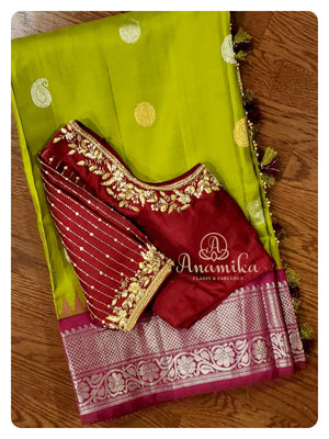 Gadwal silk/pattu saree in green/Maroon combo