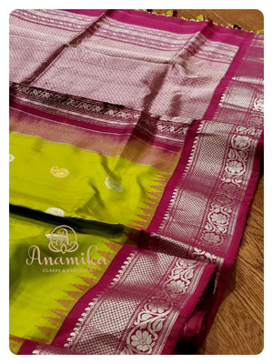 Gadwal silk/pattu saree in green/Maroon combo