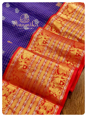 Blue/Red Kuppadam saree with Kanchi border