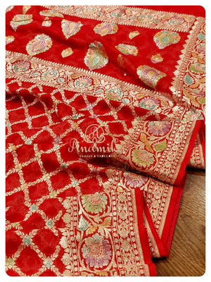 Red Banarasi Georgette Saree with off white net worked blouse