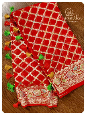 Red Banarasi Georgette Saree with off white net worked blouse