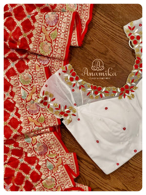Red Banarasi Georgette Saree with off white net worked blouse
