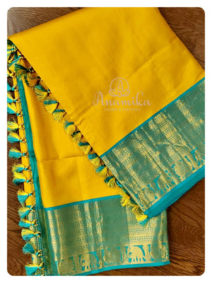 Yellow/Blue Kanchipattu saree with blue blouse