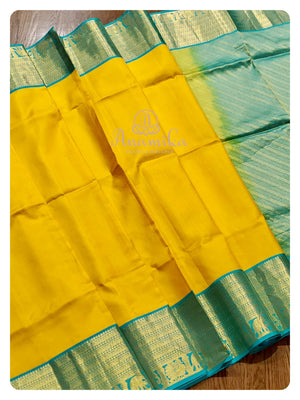 Yellow/Blue Kanchipattu saree with blue blouse