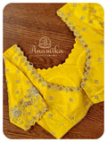 Yellow blouse with silverwork