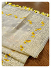 Off white organza saree with a sleeveless yellow blouse