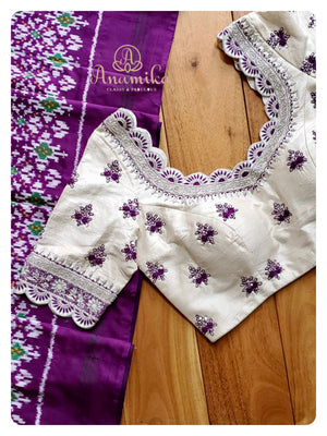 Purple Ikkat Patola Saree with contrast work blouse