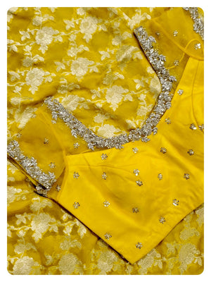 Yellow Banarasi Georgette Saree with a net based blouse