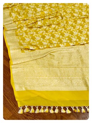 Yellow Banarasi Georgette Saree with a net based blouse