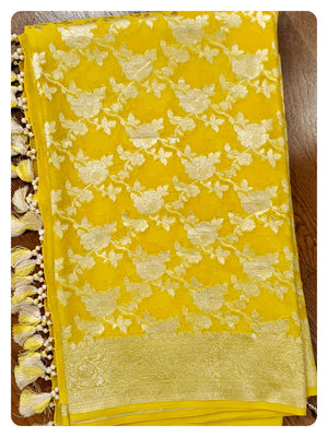 Yellow Banarasi Georgette Saree with a net based blouse