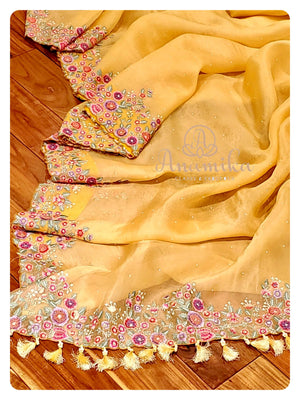 Yellow Organza Saree with Thread work border - with a yellow handwork blouse