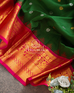 Dark Green Gadwal Silk saree with pink contrast border