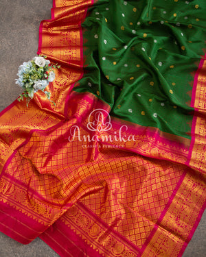 Dark Green Gadwal Silk saree with pink contrast border