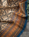 Tussar silk saree paired with a beautiful contrast black blouse