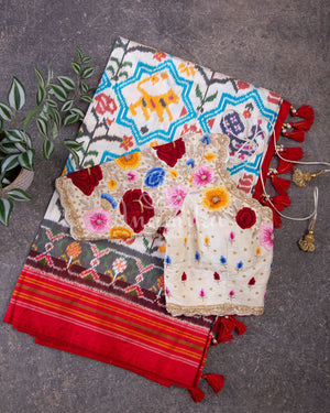 White Ikkat Saree with patan patola inspired motifs