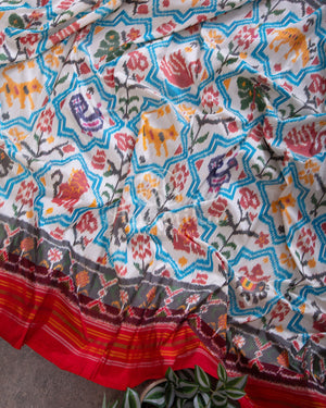 White Ikkat Saree with patan patola inspired motifs