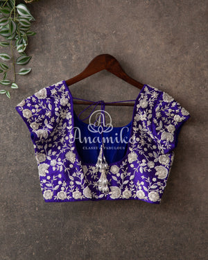 Lavender Kanchipattu saree with contrast purplish blue work blouse