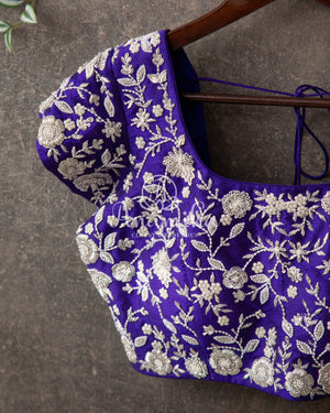 Lavender Kanchipattu saree with contrast purplish blue work blouse