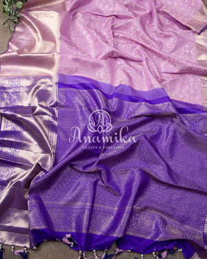 Lavender Kanchipattu saree with contrast purplish blue work blouse
