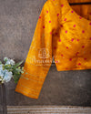 Yellow pure silk blouse with bandini and chikankari on sleeve edge